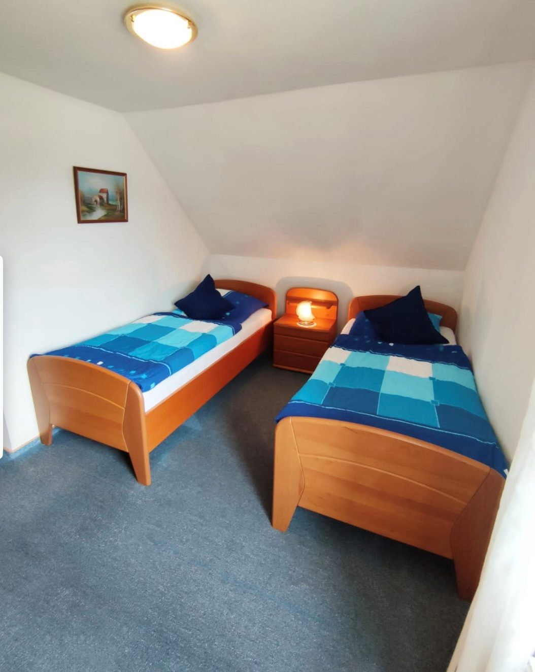 Zweites Schlafzimmer mit Einzelbetten
