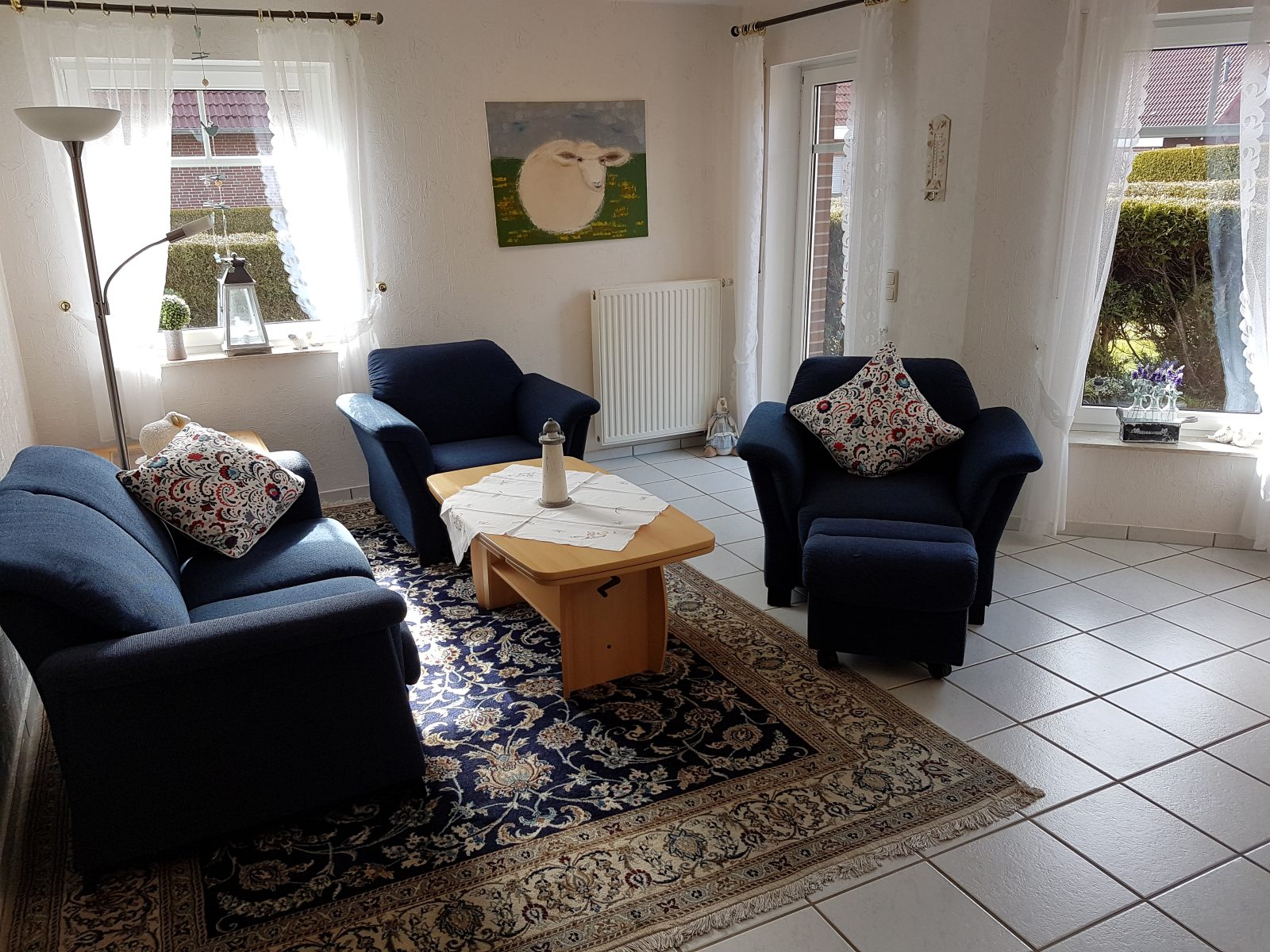 Wohnzimmer mit Couchgarnitur im Ferienhaus Wichmann